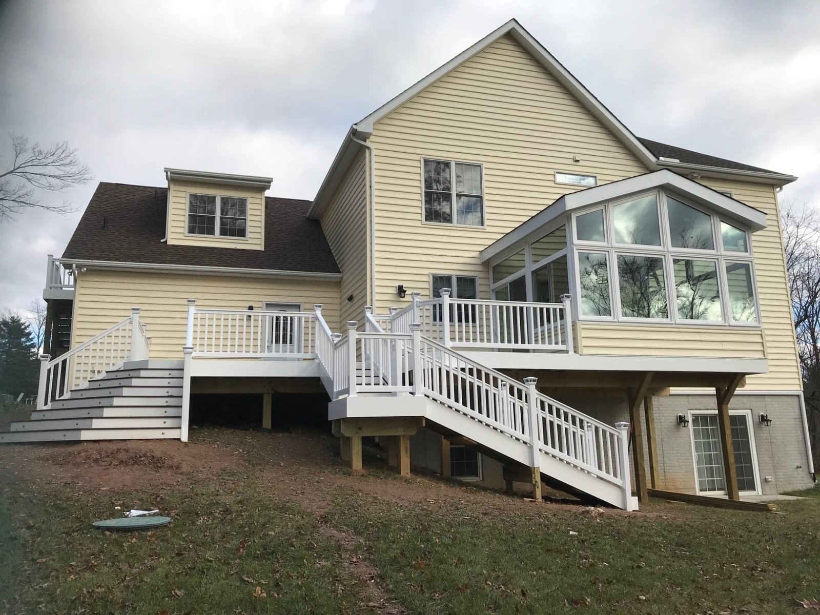Sunroom with deck home Addition