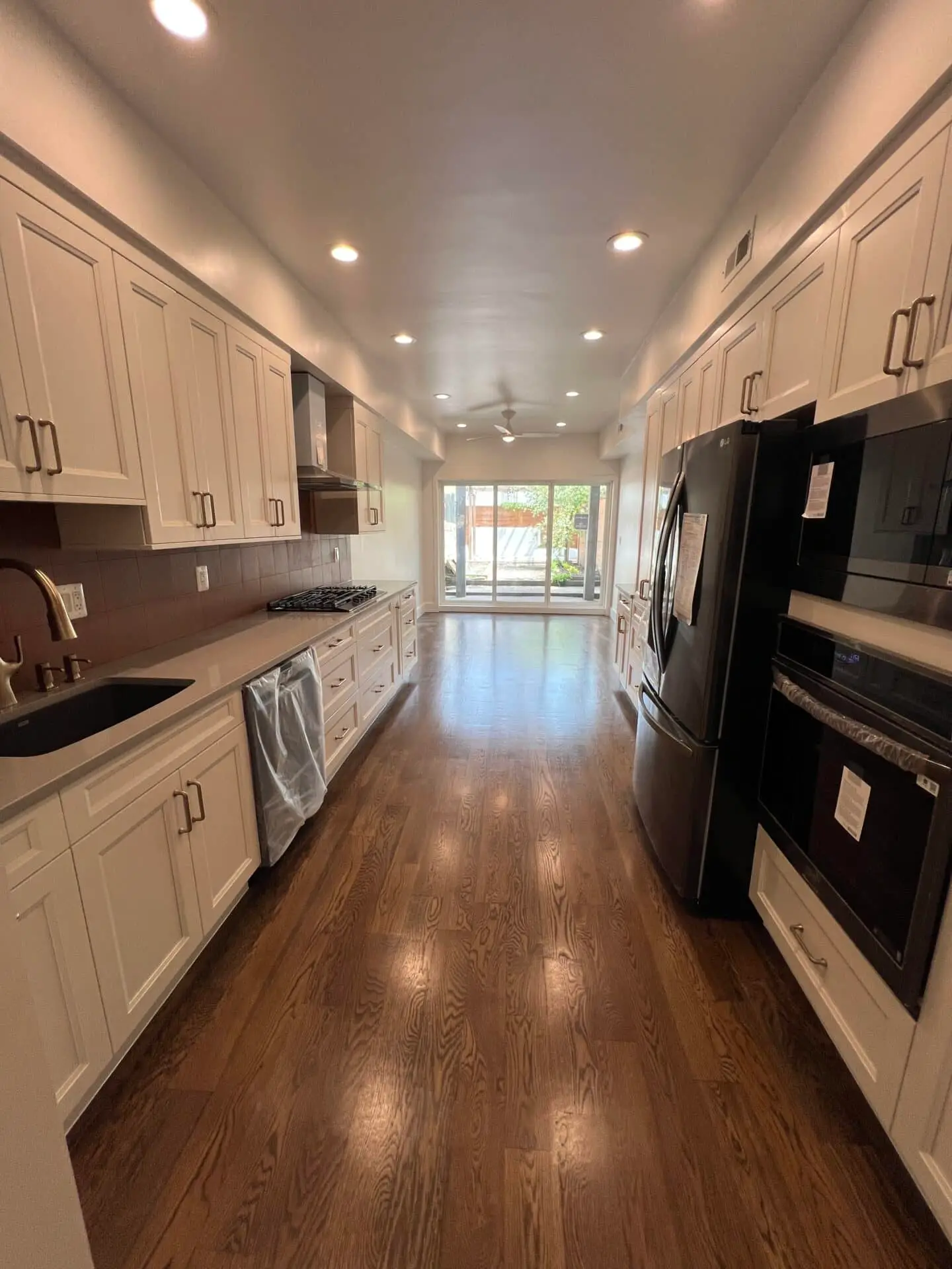 Total Home Renovation Fells Point Baltimore City Kitchen Hardwood Floor Refinishing After